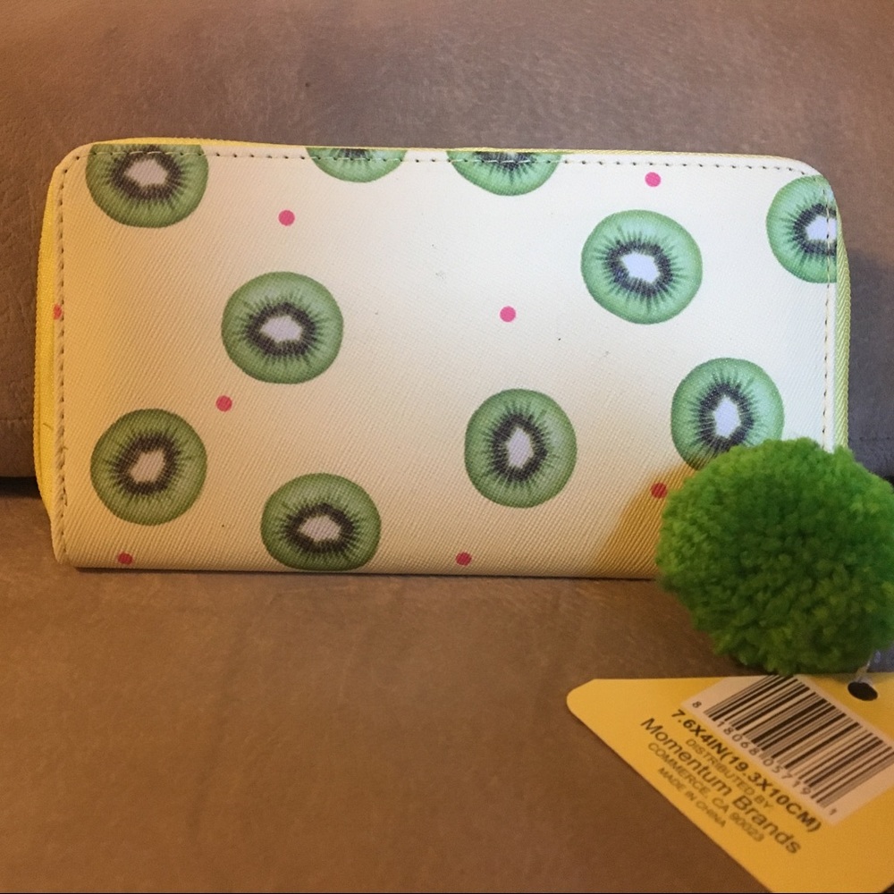 😊FREE😊W/ $30 Purchase - NWT wallet with a kiwi 🥝 design & Pom-Pom pull